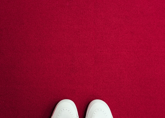 White shoes on red carpet